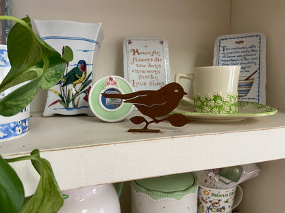 Rusty Bird on Branch